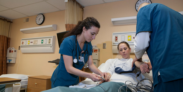 Graphic of Nursing Students working in Lab
