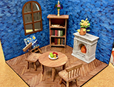 a miniature diarama of a dining room
