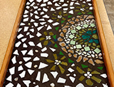 A tray with mosaic top
